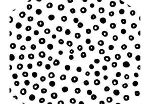 Black dots arranged in a roughly circular pattern on a white background, forming an abstract, dappled design reminiscent of pomegranate seeds.