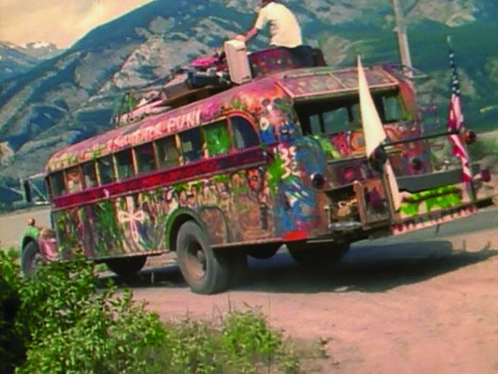Further, the original Merry Prankster bus with Ken Kesey on the roof, 1964