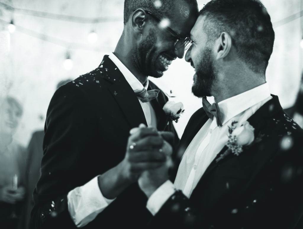 Newlywed Gay Couple Dancing on Wedding Celebration