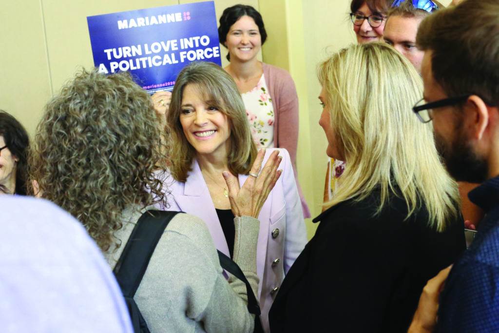 Marianne with people and poster Turn Love Into a Political Force