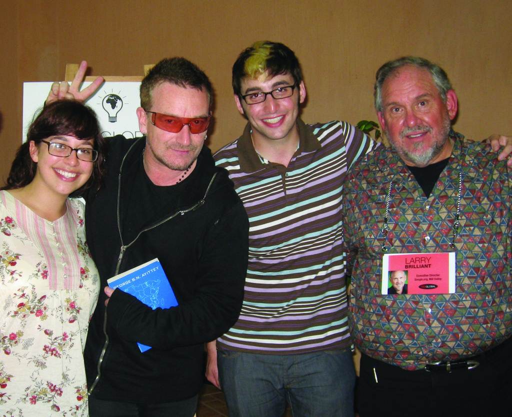 From left to right: His daughter Iris, Bono, his son Jon (who died in 2010 of cancer) and Larry