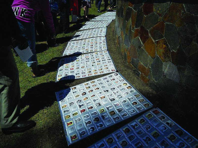 Pictures memorializing Jonestown casualties.