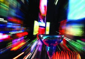 A vibrant cocktail glass surrounded by blurred lights and festive objects, depicting a dynamic and colorful party atmosphere with whispers of last words floating in the air.